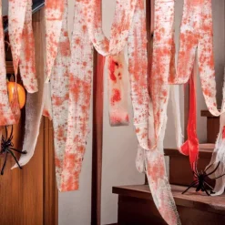Materiał dekoracyjny Halloween zakrwawiony bandaż 8 cm x 10 m